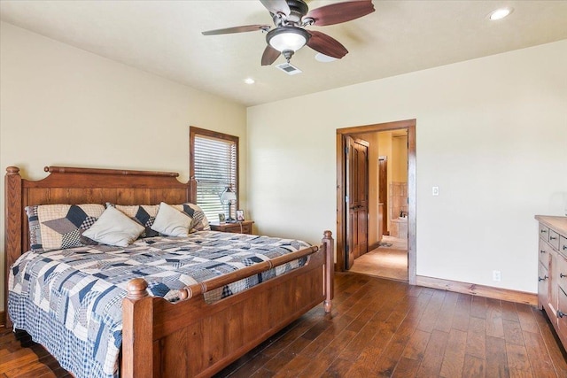 bedroom with ceiling fan and dark hardwood / wood-style floors