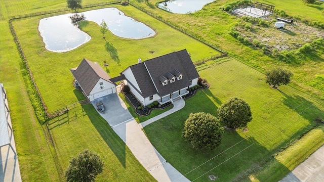 birds eye view of property featuring a rural view