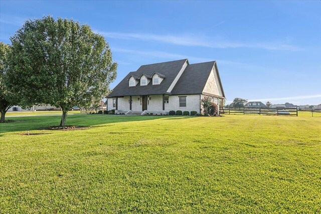 view of front of home with a front lawn