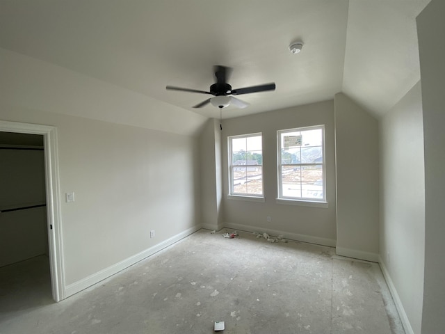 bonus room with ceiling fan and vaulted ceiling