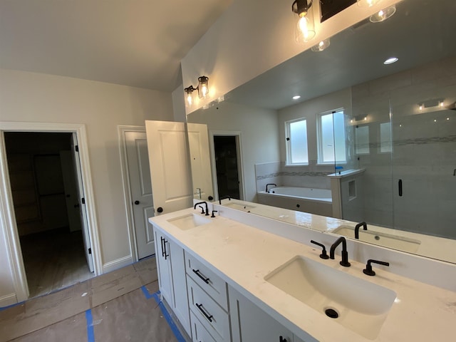 bathroom with separate shower and tub, tile patterned flooring, and vanity