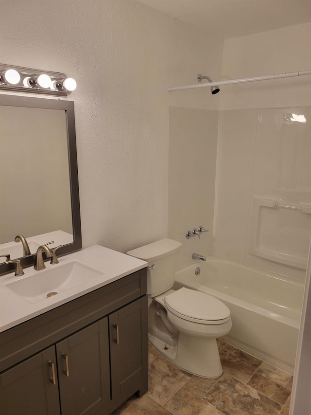 full bathroom featuring vanity, shower / bath combination, and toilet