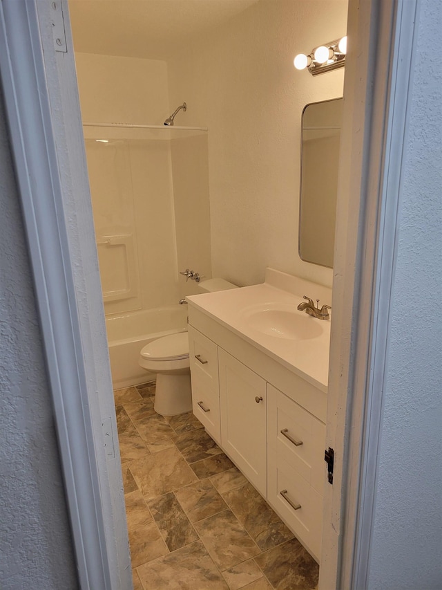 full bathroom featuring vanity, shower / bathtub combination, and toilet