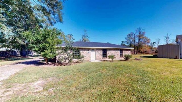 exterior space featuring a lawn