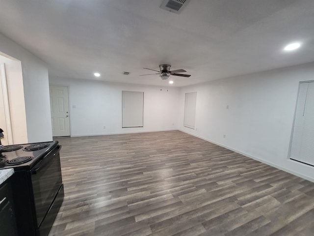 living room with hardwood / wood-style floors and ceiling fan