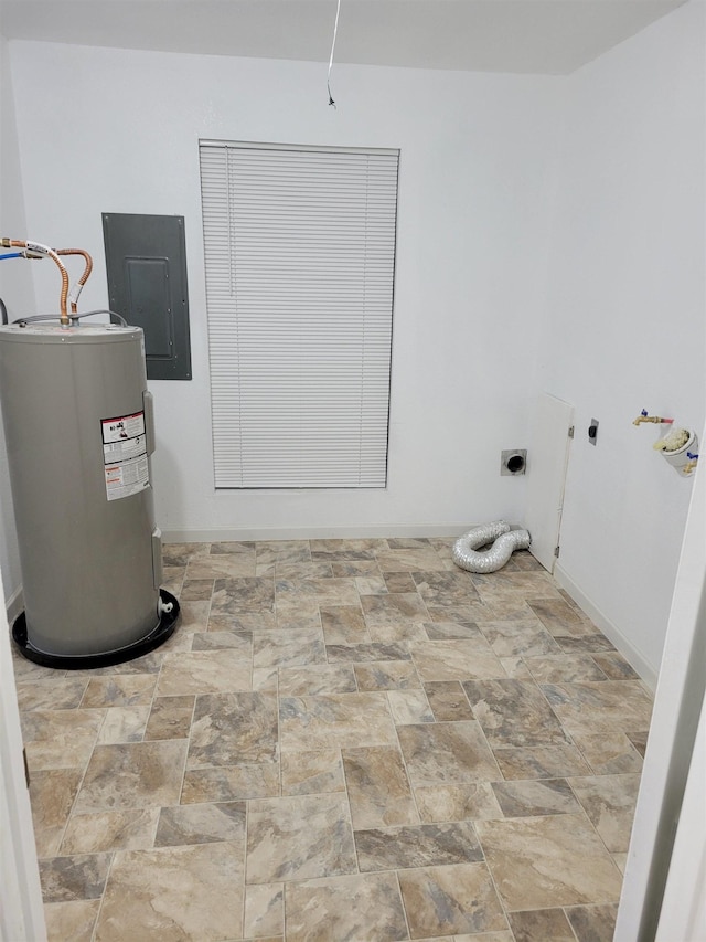 washroom with electric panel, electric dryer hookup, and water heater