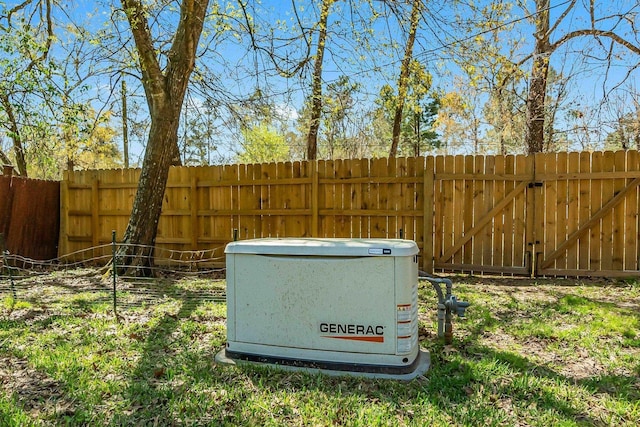 exterior space with a power unit and fence