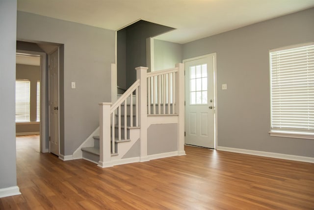 2716 22nd St, Port Arthur, TX 77640 - foyer entrance with wood finished floors and stairway