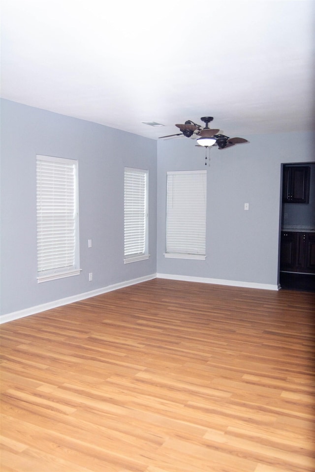 2716 22nd St, Port Arthur, TX 77640 - unfurnished room with light wood-style flooring and ceiling fan