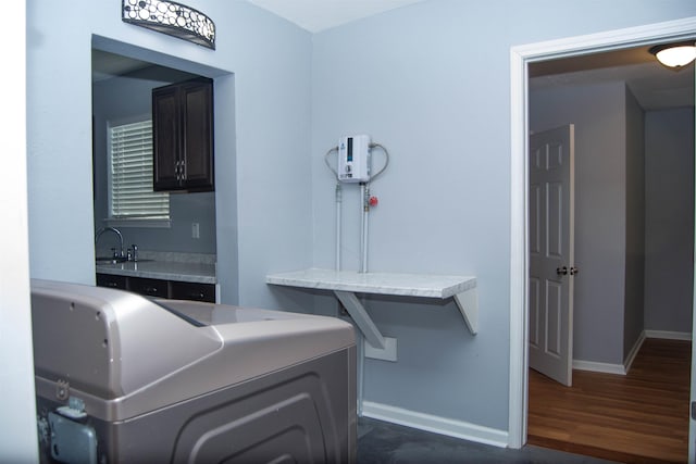 2716 22nd St, Port Arthur, TX 77640 - bathroom featuring wood finished floors and separate washer and dryer