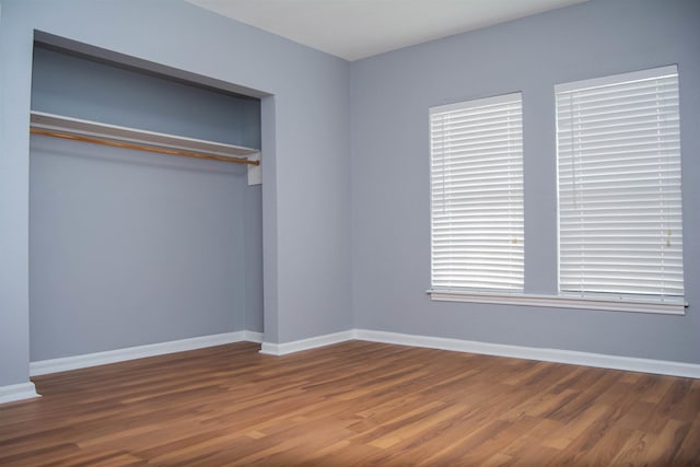 2716 22nd St, Port Arthur, TX 77640 - unfurnished bedroom with a closet and wood finished floors