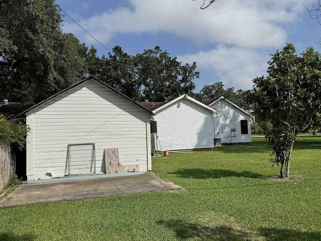 2515 Date St, Port Arthur, TX 77642 - view of side of home featuring a lawn