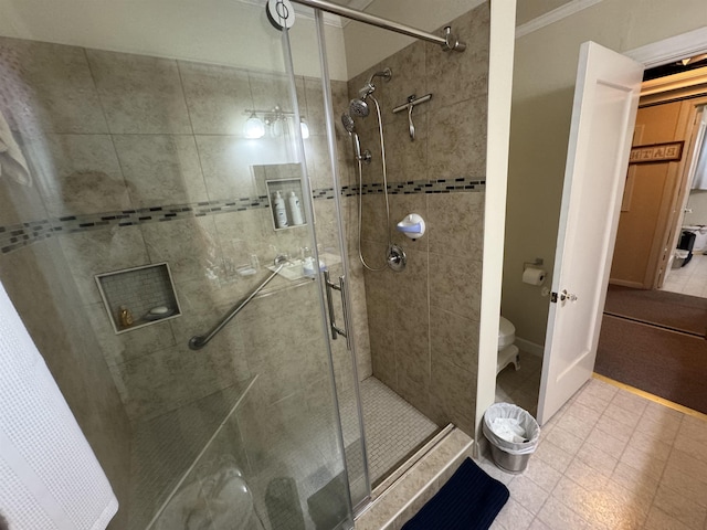 2515 Date St, Port Arthur, TX 77642 - full bath with a stall shower, toilet, and tile patterned flooring