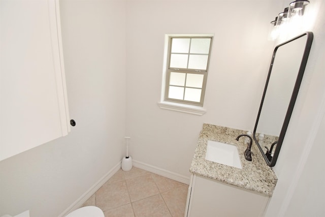 bathroom with vanity and tile patterned floors