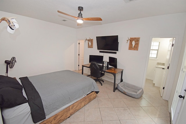 bedroom featuring light tile patterned floors and ceiling fan