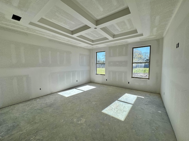 spare room featuring coffered ceiling