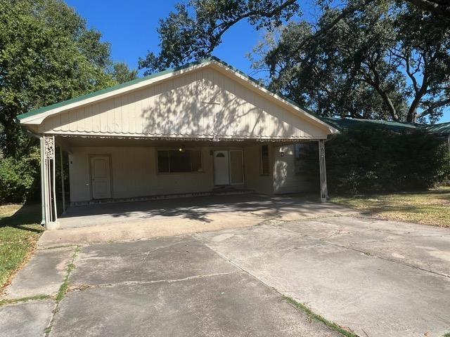 view of front of house with a carport