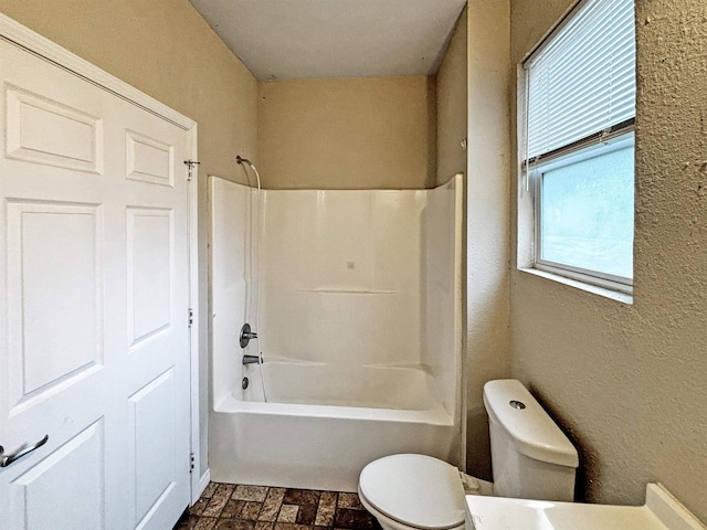 full bathroom with shower / tub combination, vanity, and toilet