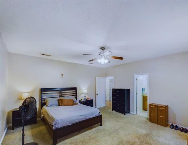 8135 Dawn Dr, Beaumont, TX 77705 - bedroom featuring light colored carpet, baseboards, and a ceiling fan