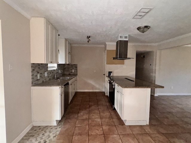 kitchen with decorative backsplash, kitchen peninsula, extractor fan, sink, and white cabinets