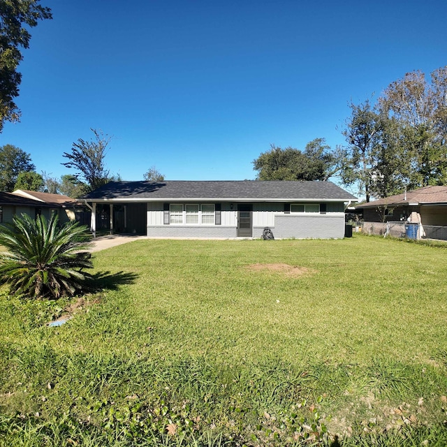 exterior space with a front yard