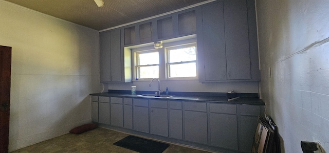 kitchen featuring gray cabinets and sink