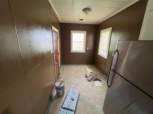 2849 12th St, Port Arthur, TX 77642 - kitchen featuring freestanding refrigerator and light floors