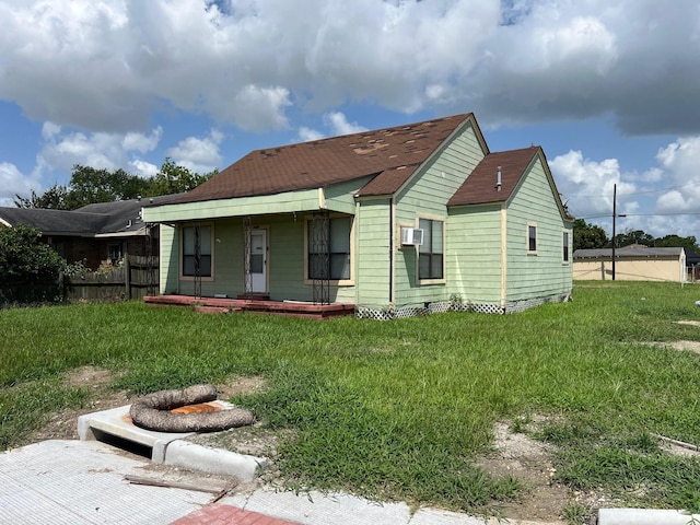2849 12th St, Port Arthur, TX 77642 - rear view of property with a porch and a shingled roof