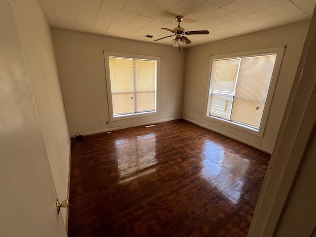 2849 12th St, Port Arthur, TX 77642 - unfurnished room featuring plenty of natural light, wood finished floors, and ceiling fan