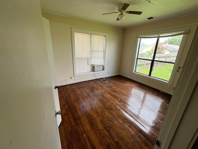 2849 12th St, Port Arthur, TX 77642 - spare room with hardwood / wood-style flooring, a ceiling fan, and cooling unit