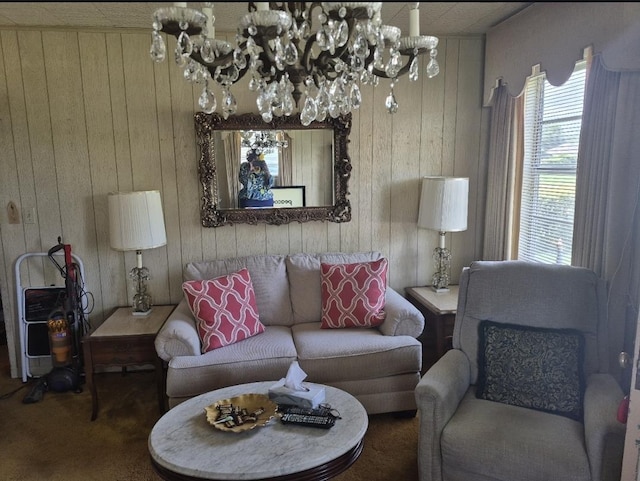 301 Morrell Blvd, Orange, TX 77630 - living area featuring wood walls, a chandelier, and carpet