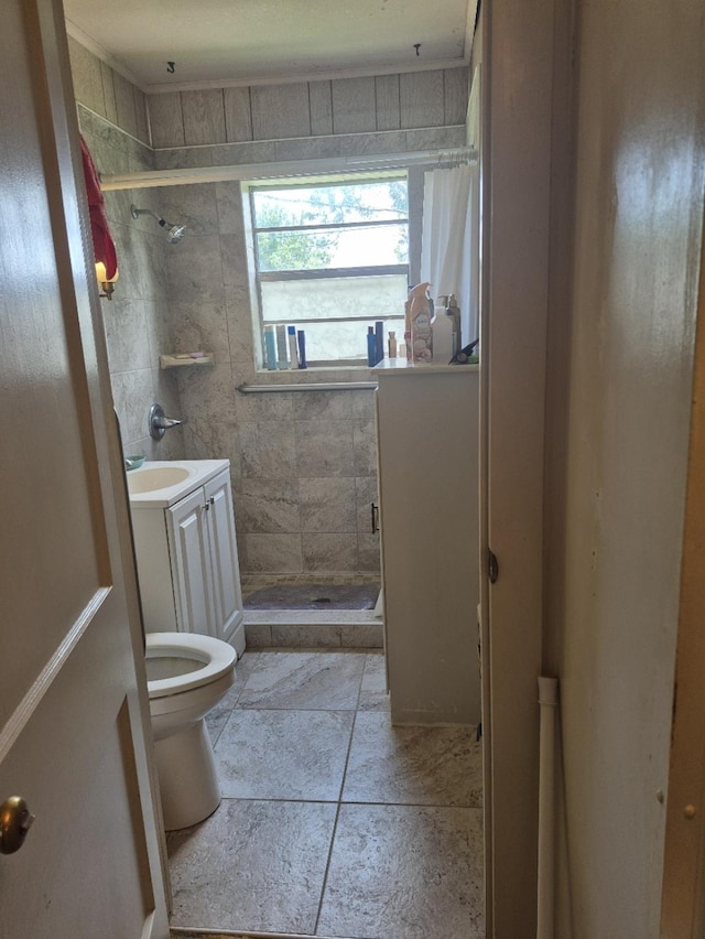 301 Morrell Blvd, Orange, TX 77630 - bathroom featuring toilet, a stall shower, and vanity