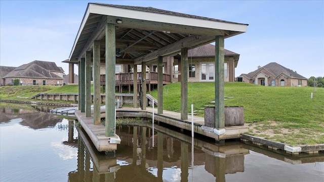 1215 Bourbon St, Bridge City, TX 77611 - dock featuring a water view and a yard