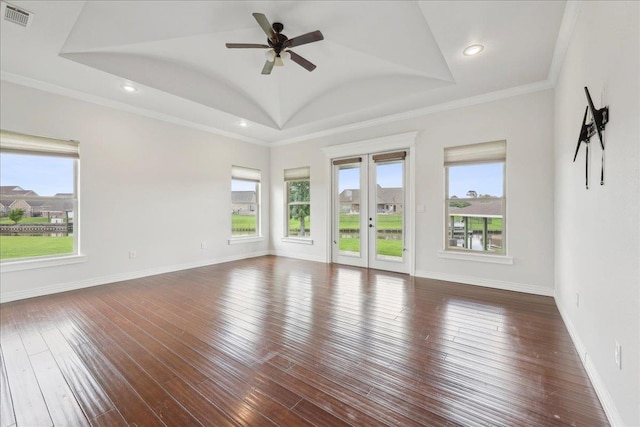 1215 Bourbon St, Bridge City, TX 77611 - unfurnished living room featuring healthy amount of natural light, french doors, ceiling fan, wood-type flooring, and recessed lighting