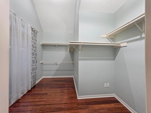 3760 Seminole Dr, Beaumont, TX 77707 - spacious closet featuring wood finished floors and lofted ceiling