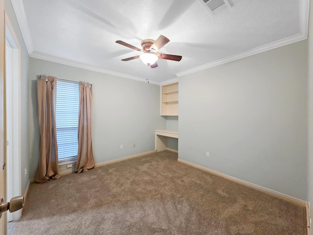 3760 Seminole Dr, Beaumont, TX 77707 - carpeted spare room with a ceiling fan, ornamental molding, baseboards, and a textured ceiling