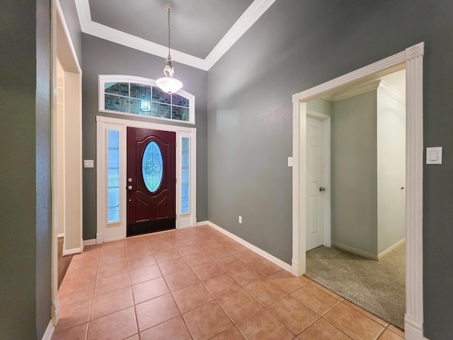 3760 Seminole Dr, Beaumont, TX 77707 - foyer entrance with ornamental molding, light tile patterned floors, baseboards, and a high ceiling