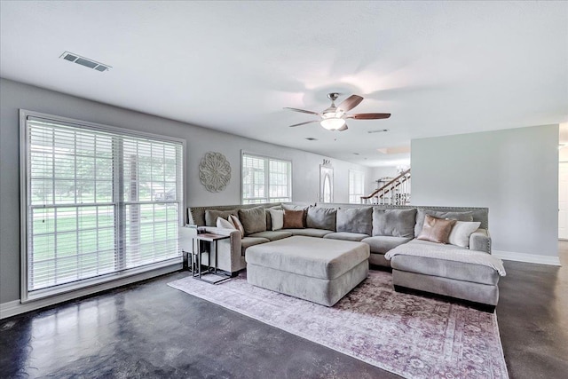 109 Twin Pines Cir, Beaumont, TX 77705 - living area with a ceiling fan, baseboards, and finished concrete floors