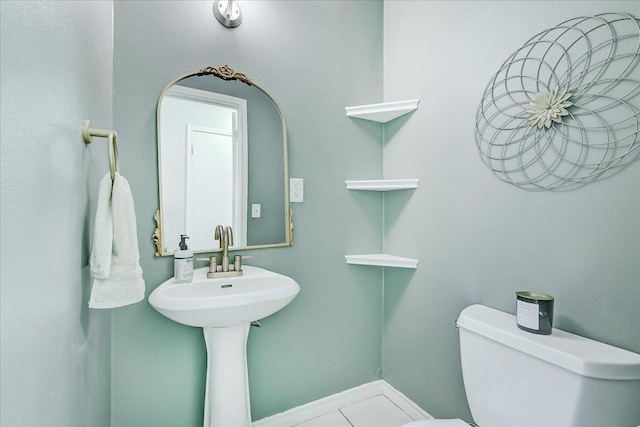 109 Twin Pines Cir, Beaumont, TX 77705 - half bath with toilet, tile patterned flooring, and baseboards