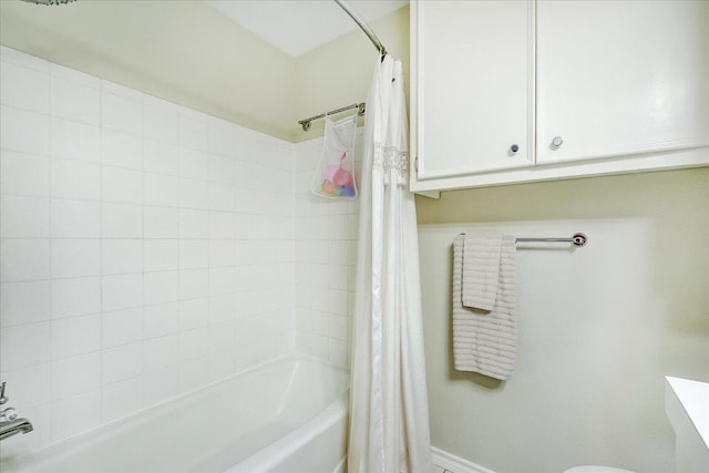109 Twin Pines Cir, Beaumont, TX 77705 - full bath featuring shower / bath combo with shower curtain, toilet, and baseboards