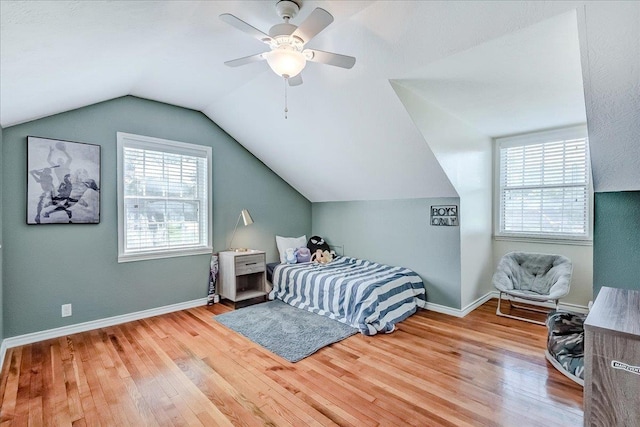 109 Twin Pines Cir, Beaumont, TX 77705 - bedroom with wood finished floors, vaulted ceiling, ceiling fan, and baseboards