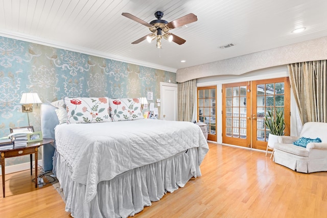 bedroom with access to outside, french doors, crown molding, hardwood / wood-style flooring, and ceiling fan