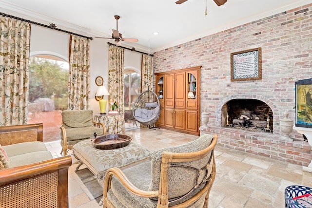 living room with a brick fireplace, crown molding, and brick wall