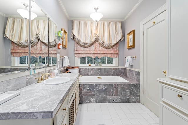 bathroom with vanity, crown molding, and tiled tub