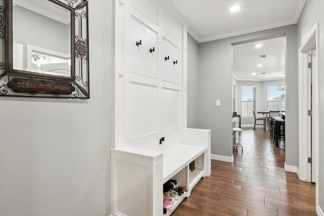 mudroom featuring crown molding