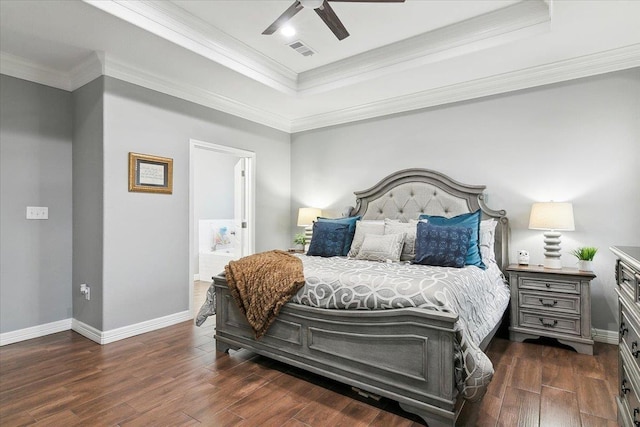 bedroom with ceiling fan, ornamental molding, and a tray ceiling