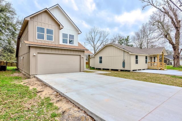 view of front of house with a garage and a front yard