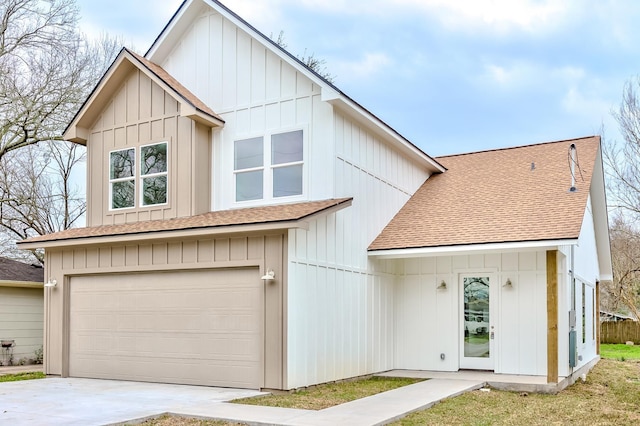 modern farmhouse style home with a garage