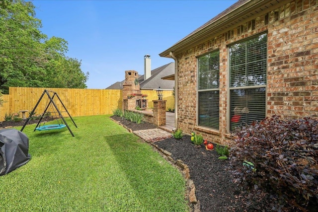 view of yard with a fenced backyard