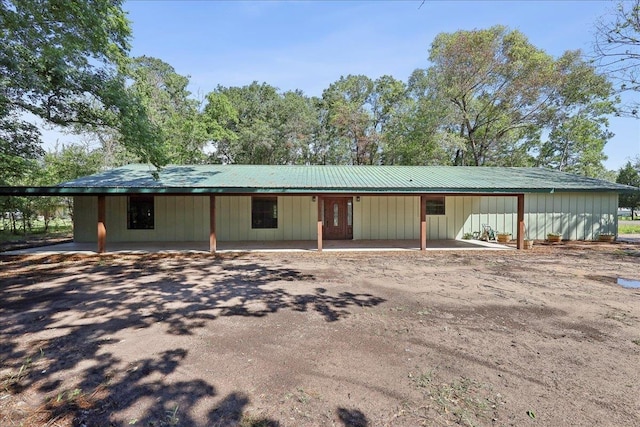 42252 State Highway 87, Orange, TX 77632 - view of front of property with board and batten siding
